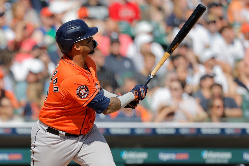 Aug 27, 2023; Detroit, Michigan, USA;  Houston Astros catcher Martin Maldonado (15) hits a home run in the seventh inning against the Detroit Tigers at Comerica Park. Mandatory Credit: Rick Osentoski-USA TODAY Sports