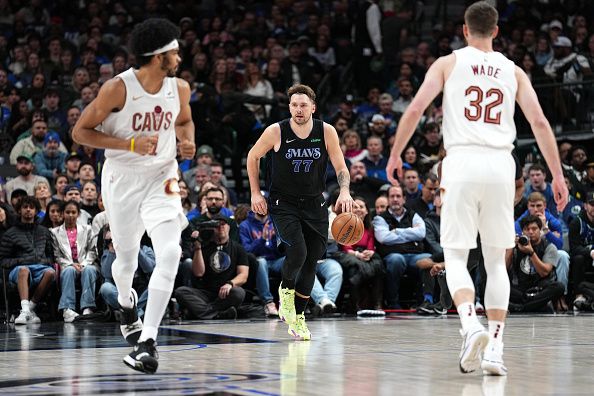 DALLAS, TX - DECEMBER 27: Luka Doncic #77 of the Dallas Mavericks dribbles the ball during the game against the Cleveland Cavaliers on December 27, 2023 at the American Airlines Center in Dallas, Texas. NOTE TO USER: User expressly acknowledges and agrees that, by downloading and or using this photograph, User is consenting to the terms and conditions of the Getty Images License Agreement. Mandatory Copyright Notice: Copyright 2023 NBAE (Photo by Glenn James/NBAE via Getty Images)