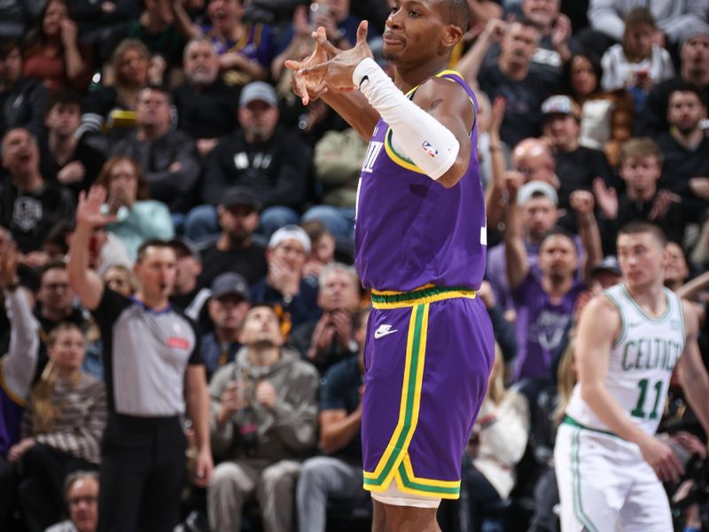 SALT LAKE CITY, UT - MARCH 12:  Kris Dunn #11 of the Utah Jazz celebrates during the game on March 12, 2024 at Delta Center in Salt Lake City, Utah. NOTE TO USER: User expressly acknowledges and agrees that, by downloading and or using this Photograph, User is consenting to the terms and conditions of the Getty Images License Agreement. Mandatory Copyright Notice: Copyright 2024 NBAE (Photo by Melissa Majchrzak/NBAE via Getty Images)