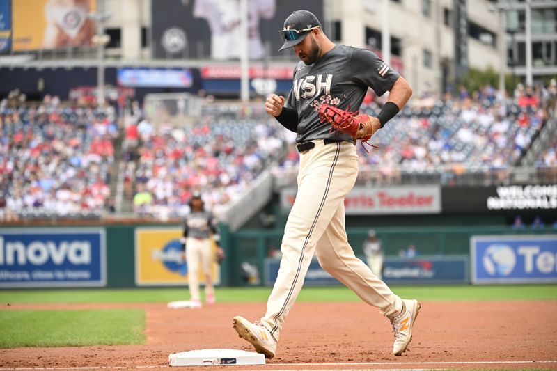 Aug 31, 2024; Washington, District of Columbia, USA; Washington Nationals first baseman Joey Gallo (24) steps on first base for an out against the Chicago Cubs during the second inning at Nationals Park. Mandatory Credit: Rafael Suanes-USA TODAY Sports