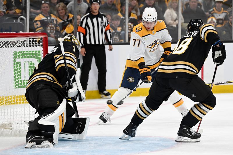 Oct 14, 2023; Boston, Massachusetts, USA; Nashville Predators right wing Luke Evangelista (77) attempts a shot against Boston Bruins goaltender Jeremy Swayman (1) during the first period at the TD Garden. Mandatory Credit: Brian Fluharty-USA TODAY Sports