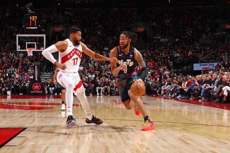 TORONTO, CANADA - MARCH 25: Trendon Watford #9 of the Brooklyn Nets handles the ball during the game against the Toronto Raptors on March 25, 2024 at the Scotiabank Arena in Toronto, Ontario, Canada.  NOTE TO USER: User expressly acknowledges and agrees that, by downloading and or using this Photograph, user is consenting to the terms and conditions of the Getty Images License Agreement.  Mandatory Copyright Notice: Copyright 2024 NBAE (Photo by Vaughn Ridley/NBAE via Getty Images)