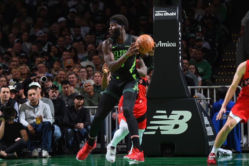 BOSTON, MA - NOVEMBER 16: Neemias Queta #88 of the Boston Celtics dribbles the ball during the game against the Toronto Raptors on November 16, 2024 at TD Garden in Boston, Massachusetts. NOTE TO USER: User expressly acknowledges and agrees that, by downloading and/or using this Photograph, user is consenting to the terms and conditions of the Getty Images License Agreement. Mandatory Copyright Notice: Copyright 2024 NBAE (Photo by Brian Babineau/NBAE via Getty Images)