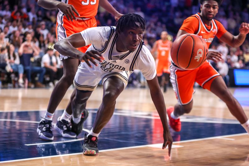 Feb 17, 2024; Atlanta, Georgia, USA; Georgia Tech Yellow Jackets forward Baye Ndongo (11) reaches for the ball against the Syracuse Orange in the second half at McCamish Pavilion. Mandatory Credit: Brett Davis-USA TODAY Sports
