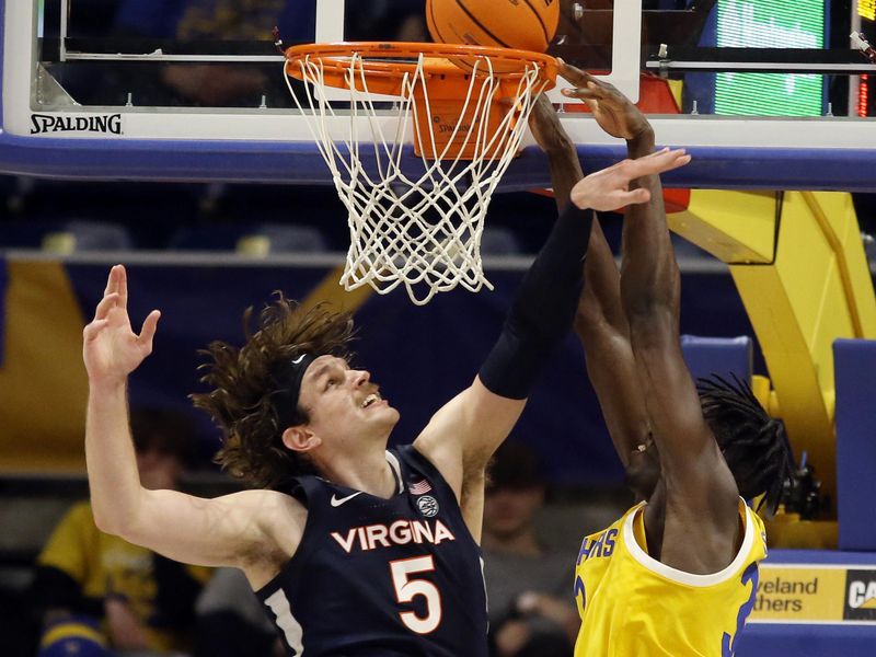 Jan 3, 2023; Pittsburgh, Pennsylvania, USA; Pittsburgh Panthers center Federiko Federiko (right) shoots against Virginia Cavaliers forward Ben Vander Plas (5) during the second half at the Petersen Events Center. Pittsburgh won 68-65. Mandatory Credit: Charles LeClaire-USA TODAY Sports