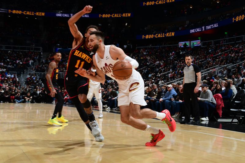 ATLANTA, GA - JANUARY 20: Max Strus #1 of the Cleveland Cavaliers drives to the basket during the game against the Atlanta Hawks/ on January 20, 2024 at State Farm Arena in Atlanta, Georgia.  NOTE TO USER: User expressly acknowledges and agrees that, by downloading and/or using this Photograph, user is consenting to the terms and conditions of the Getty Images License Agreement. Mandatory Copyright Notice: Copyright 2024 NBAE (Photo by Scott Cunningham/NBAE via Getty Images)