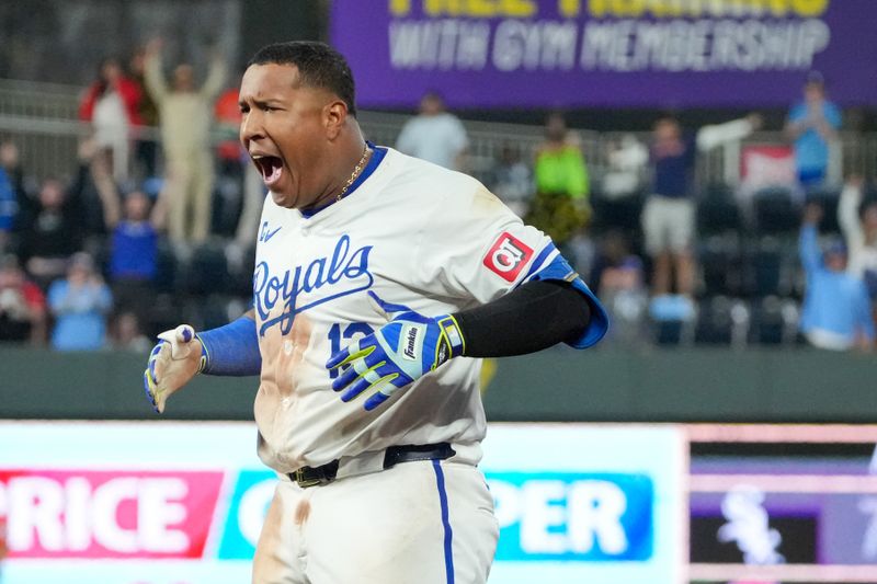 Apr 9, 2024; Kansas City, Missouri, USA; Kansas City Royals catcher Salvador Perez (13) celebrates after his one run walkout single) for the win over the Houston Astros at Kauffman Stadium. Mandatory Credit: Denny Medley-USA TODAY Sports