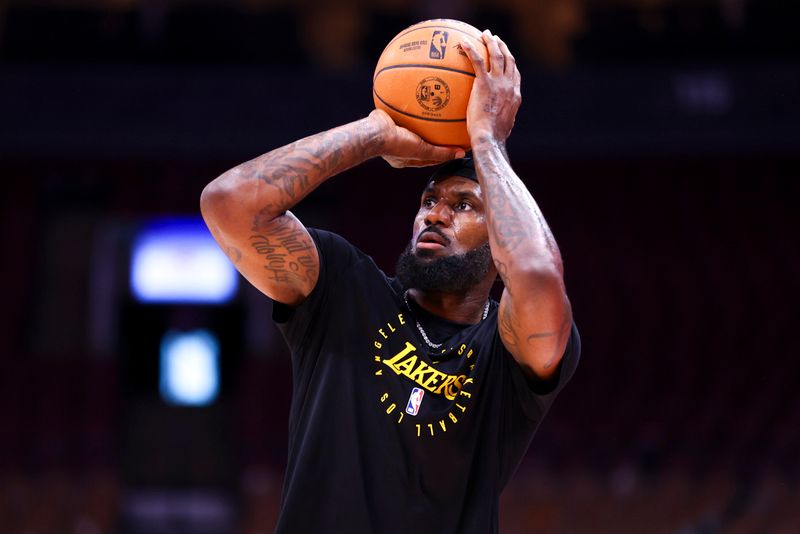 TORONTO, CANADA - NOVEMBER 1: LeBron James #23 of the Los Angeles Lakers warms up before the game against the Toronto Raptors on November 1, 2024 at the Scotiabank Arena in Toronto, Ontario, Canada.  NOTE TO USER: User expressly acknowledges and agrees that, by downloading and or using this Photograph, user is consenting to the terms and conditions of the Getty Images License Agreement.  Mandatory Copyright Notice: Copyright 2024 NBAE (Photo by Vaughn Ridley/NBAE via Getty Images)