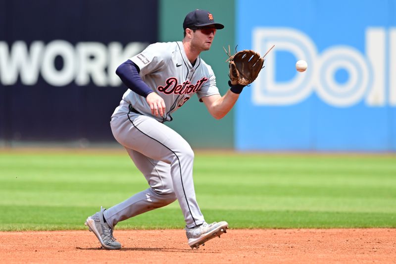 Jul 25, 2024; Cleveland, Ohio, USA; Detroit Tigers second baseman Colt Keith (33) fields a ball hit by Cleveland Guardians center fielder Angel Martinez (not pictured) during the third inning at Progressive Field. Mandatory Credit: Ken Blaze-USA TODAY Sports