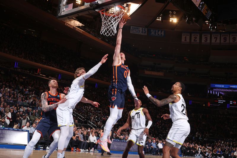 NEW YORK, NY - JANUARY 30: Donte Divincenzo #0 of the New York Knicks shoots the ball during the game against the Utah Jazz on January 30, 2024 at Madison Square Garden in New York City, New York.  NOTE TO USER: User expressly acknowledges and agrees that, by downloading and or using this photograph, User is consenting to the terms and conditions of the Getty Images License Agreement. Mandatory Copyright Notice: Copyright 2024 NBAE  (Photo by Nathaniel S. Butler/NBAE via Getty Images)