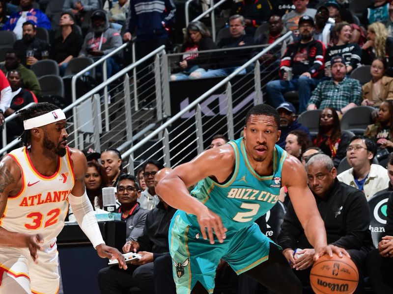 ATLANTA, GA - MARCH 23: Grant Williams #2 of the Charlotte Hornets dribbles the ball during the game against the Atlanta Hawks on March 23, 2024 at State Farm Arena in Atlanta, Georgia.  NOTE TO USER: User expressly acknowledges and agrees that, by downloading and/or using this Photograph, user is consenting to the terms and conditions of the Getty Images License Agreement. Mandatory Copyright Notice: Copyright 2024 NBAE (Photo by Scott Cunningham/NBAE via Getty Images)