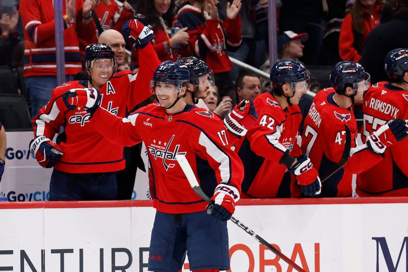 Dec 23, 2025; Washington, District of Columbia, USA; Washington Capitals center Dylan Strome (17) celebrates with teammates after scoring a goal against the New York Rangers during the second period at Capital One Arena. Mandatory Credit: Geoff Burke-Imagn Images