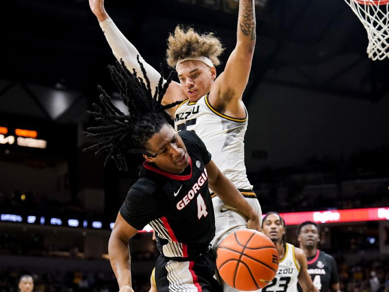 Jan 6, 2024; Columbia, Missouri, USA; Georgia Bulldogs guard Silas Demary Jr. (4) tries to shoot and is fouled by Missouri Tigers forward Noah Carter (35) during the first half at Mizzou Arena. Mandatory Credit: Denny Medley-USA TODAY Sports