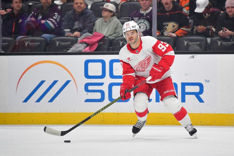 Nov 15, 2024; Anaheim, California, USA; Detroit Red Wings right wing Christian Fischer (36) controls the puck against the Anaheim Ducks during the first period at Honda Center. Mandatory Credit: Gary A. Vasquez-Imagn Images