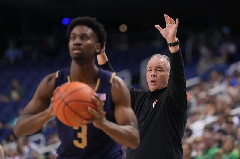 Mar 7, 2023; Greensboro, NC, USA; Virginia Tech Hokies head coach Mike Young reacts as Notre Dame Fighting Irish guard Trey Wertz (3) has the ball in the first half at Greensboro Coliseum. Mandatory Credit: Bob Donnan-USA TODAY Sports