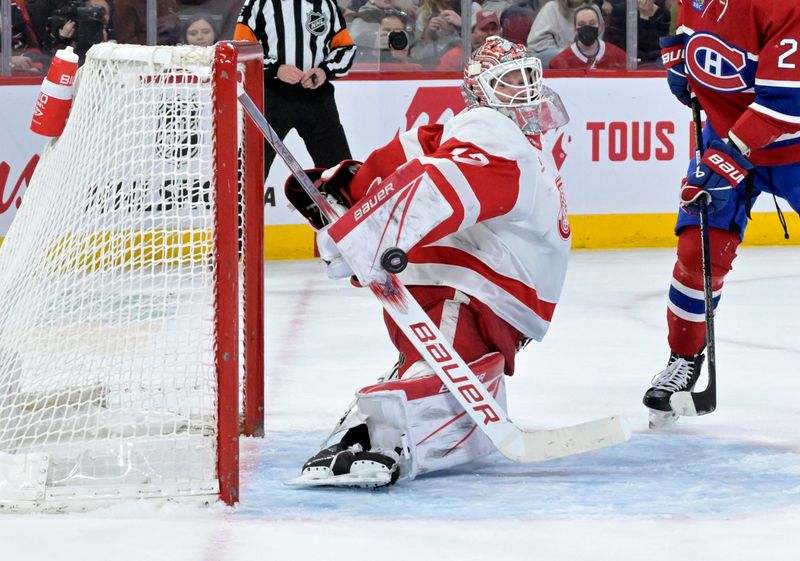 Apr 16, 2024; Montreal, Quebec, CAN; Detroit Red Wings goalie James Reimer (47) makes a blocker save against Montreal Canadiens forward Cole Caufield (22) (not pictured) during the second period at the Bell Centre. Mandatory Credit: Eric Bolte-USA TODAY Sports