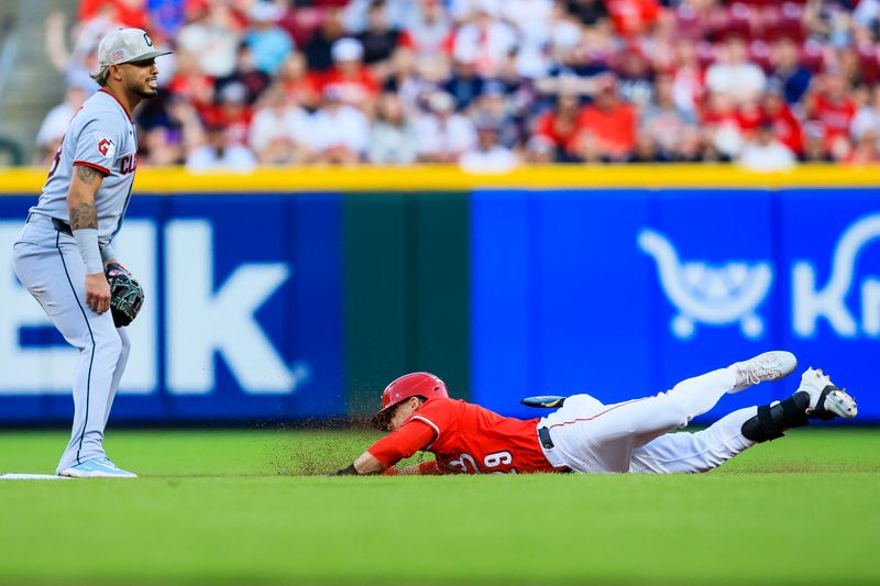 May 17, 2025; Cincinnati, Ohio, USA; Cincinnati Reds outfielder TJ Friedl (29) slides into second after hitting a double in the sixth inning against the Cleveland Guardians at Great American Ball Park. Mandatory Credit: Katie Stratman-Imagn Images