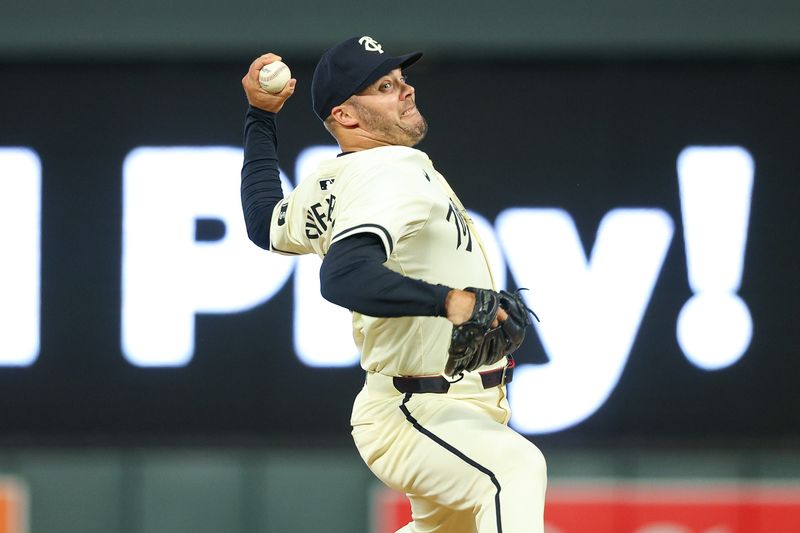 Aug 28, 2024; Minneapolis, Minnesota, USA; Minnesota Twins relief pitcher Caleb Thielbar (56) delivers a pitch against the Atlanta Braves during the seventh inning at Target Field. Mandatory Credit: Matt Krohn-USA TODAY Sports