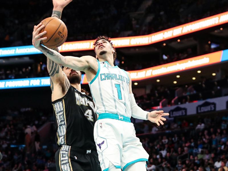 CHARLOTTE, NC - JANUARY 4: LaMelo Ball #1 of the Charlotte Hornets drives to the basket during the game against the Memphis Grizzlies on January 4, 2023 at Spectrum Center in Charlotte, North Carolina. NOTE TO USER: User expressly acknowledges and agrees that, by downloading and or using this photograph, User is consenting to the terms and conditions of the Getty Images License Agreement. Mandatory Copyright Notice: Copyright 2023 NBAE (Photo by Brock Williams-Smith/NBAE via Getty Images)