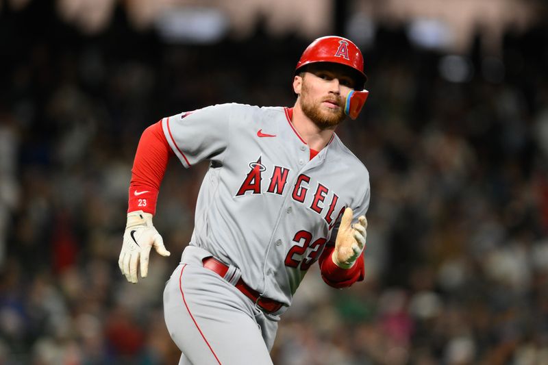 Sep 11, 2023; Seattle, Washington, USA; Los Angeles Angels second baseman Brandon Drury (23) runs the bases after hitting a two-run home run against the Seattle Mariners during the tenth inning at T-Mobile Park. Mandatory Credit: Steven Bisig-USA TODAY Sports