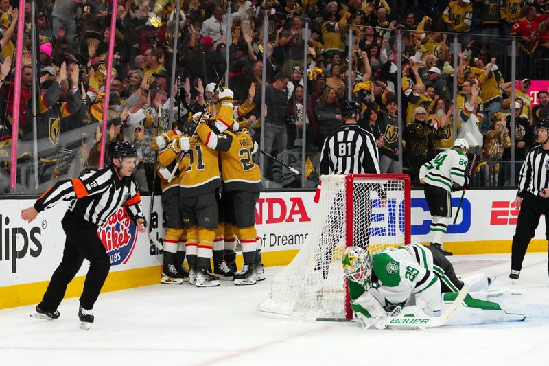 Apr 29, 2024; Las Vegas, Nevada, USA; Vegas Golden Knights right wing Michael Amadio (22) celebrates with team mates after scoring a goal against the Dallas Stars during the first period of game four of the first round of the 2024 Stanley Cup Playoffs at T-Mobile Arena. Mandatory Credit: Stephen R. Sylvanie-USA TODAY Sports