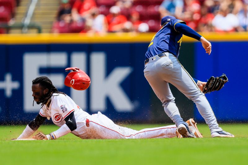 Jun 4, 2025; Cincinnati, Ohio, USA; Cincinnati Reds shortstop Elly De La Cruz (44) steals second against Milwaukee Brewers second baseman Brice Turang (2) in the sixth inning at Great American Ball Park. Mandatory Credit: Katie Stratman-Imagn Images