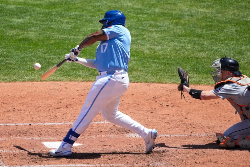 May 22, 2024; Kansas City, Missouri, USA; Kansas City Royals left fielder Nelson Velazquez (17) connects for a solo home run against the Detroit Tigers in the fourth inning at Kauffman Stadium. Mandatory Credit: Denny Medley-USA TODAY Sports