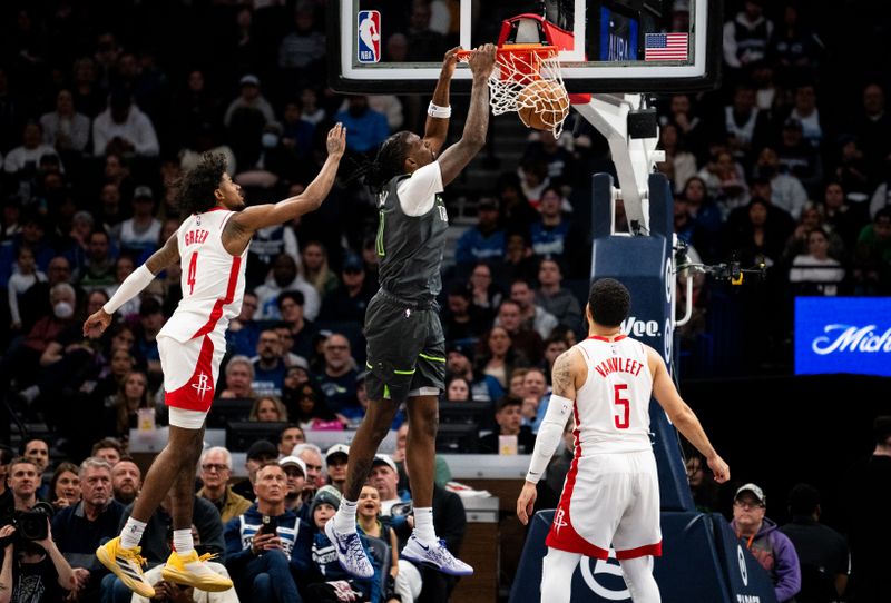 MINNEAPOLIS, MINNESOTA - APRIL 2: Naz Reid #11 of the Minnesota Timberwolves dunks the ball in the second quarter of the game against the Houston Rockets at Target Center on April 2, 2024 in Minneapolis, Minnesota. NOTE TO USER: User expressly acknowledges and agrees that, by downloading and or using this photograph, User is consenting to the terms and conditions of the Getty Images License Agreement. (Photo by Stephen Maturen/Getty Images)