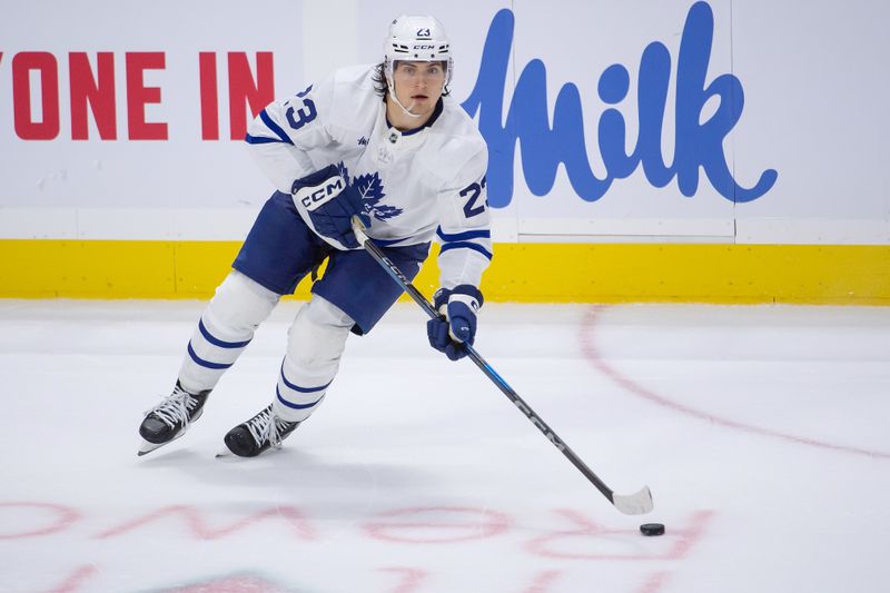 Sep 24, 2024; Ottawa, Ontario, CAN; Toronto Maple Leafs left swing Matthew Knies (23) skates with the puck in the third period against the Ottawa Senators at the Canadian Tire Centre. Mandatory Credit: Marc DesRosiers-Imagn Images