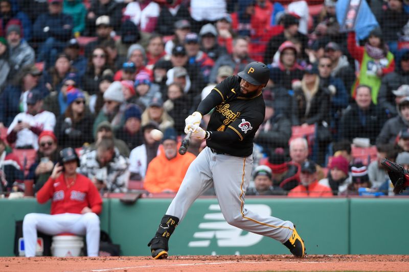 Apr 5, 2023; Boston, Massachusetts, USA; Pittsburgh Pirates first baseman Carlos Santana (41) hits a home run against the Boston Red Sox at Fenway Park. Mandatory Credit: Eric Canha-USA TODAY Sports