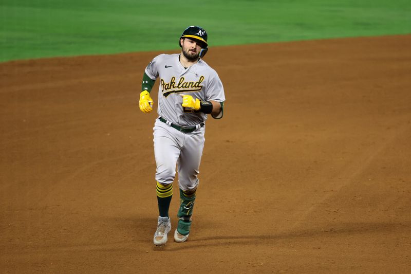 Sep 30, 2023; Anaheim, California, USA; Oakland Athletics catcher Shea Langeliers (23) runs around bases after hitting a 3-run home run during the eighth inning against the Los Angeles Angels at Angel Stadium. Mandatory Credit: Kiyoshi Mio-USA TODAY Sports