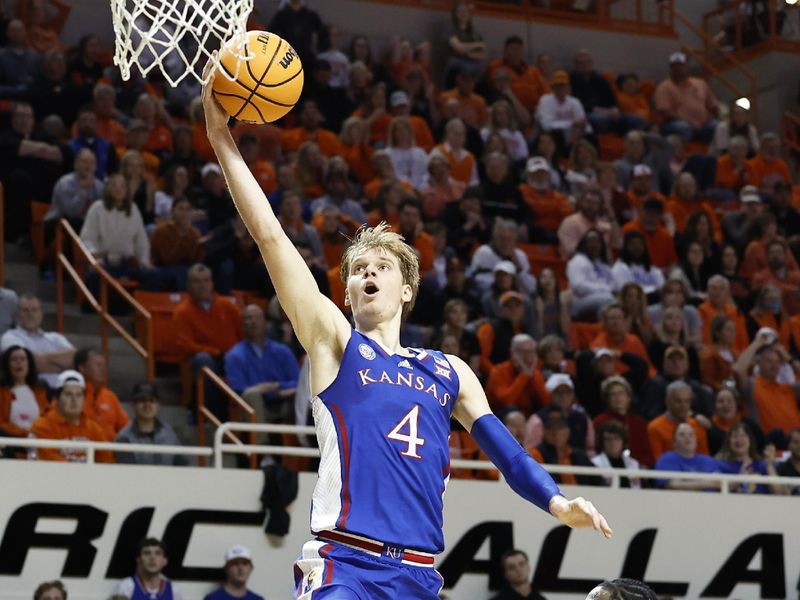 Feb 14, 2023; Stillwater, Oklahoma, USA; Kansas Jayhawks guard Gradey Dick (4) goes up for a basket against the Oklahoma State Cowboys during the second half at Gallagher-Iba Arena. Kansas won 87-76. Mandatory Credit: Alonzo Adams-USA TODAY Sports