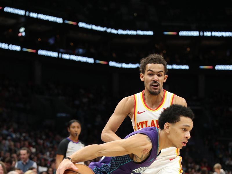 CHARLOTTE, NC - FEBRUARY 14: Kai Jones #23 of the Charlotte Hornets handles the ball during the game against the Atlanta Hawks on February 14, 2024 at Spectrum Center in Charlotte, North Carolina. NOTE TO USER: User expressly acknowledges and agrees that, by downloading and or using this photograph, User is consenting to the terms and conditions of the Getty Images License Agreement.  Mandatory Copyright Notice:  Copyright 2024 NBAE (Photo by Brock Williams-Smith/NBAE via Getty Images)