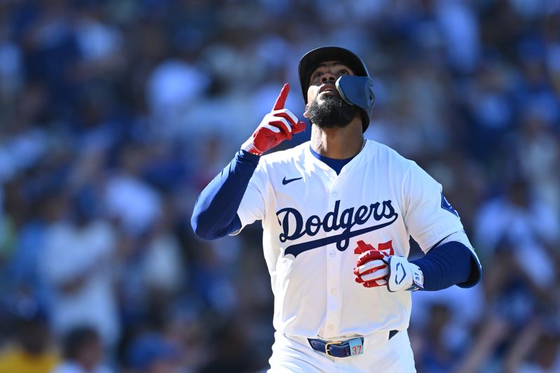 Jul 21, 2024; Los Angeles, California, USA; Los Angeles Dodgers outfielder Teoscar Hernández (37) gestures after hitting a home run against the Boston Red Sox during the third inning at Dodger Stadium. Mandatory Credit: Jonathan Hui-USA TODAY Sports