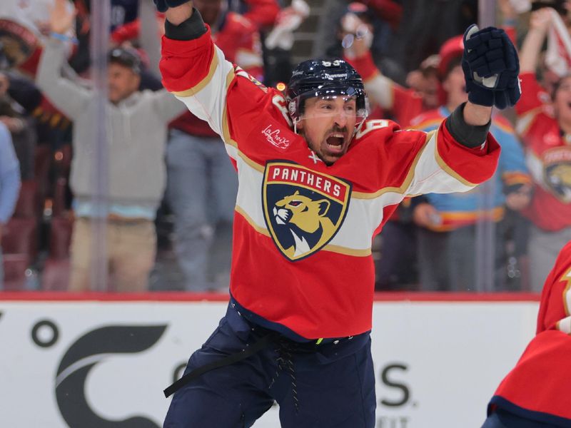 May 9, 2025; Sunrise, Florida, USA; Florida Panthers center Brad Marchand (63) celebrates after scoring the game-winning goal against the Toronto Maple Leafs during overtime in game three of the second round of the 2025 Stanley Cup Playoffs at Amerant Bank Arena. Mandatory Credit: Sam Navarro-Imagn Images