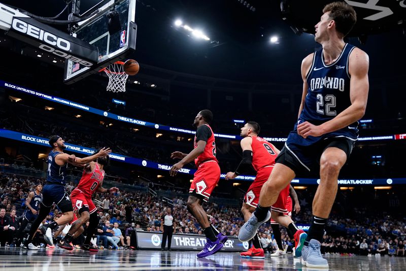 ORLANDO, FLORIDA - APRIL 07: Franz Wagner #22 of the Orlando Magic looks back after taking a shot against the Chicago Bulls during the first quarter at Kia Center on April 07, 2024 in Orlando, Florida. NOTE TO USER: User expressly acknowledges and agrees that, by downloading and or using this photograph, User is consenting to the terms and conditions of the Getty Images License Agreement. (Photo by Rich Storry/Getty Images)