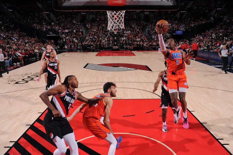 PORTLAND, OR - NOVEMBER 1: Jalen Williams #8 of the Oklahoma City Thunder drives to the basket during the game against the Portland Trail Blazers on November 1, 2024 at the Moda Center Arena in Portland, Oregon. NOTE TO USER: User expressly acknowledges and agrees that, by downloading and or using this photograph, user is consenting to the terms and conditions of the Getty Images License Agreement. Mandatory Copyright Notice: Copyright 2024 NBAE (Photo by Cameron Browne/NBAE via Getty Images)