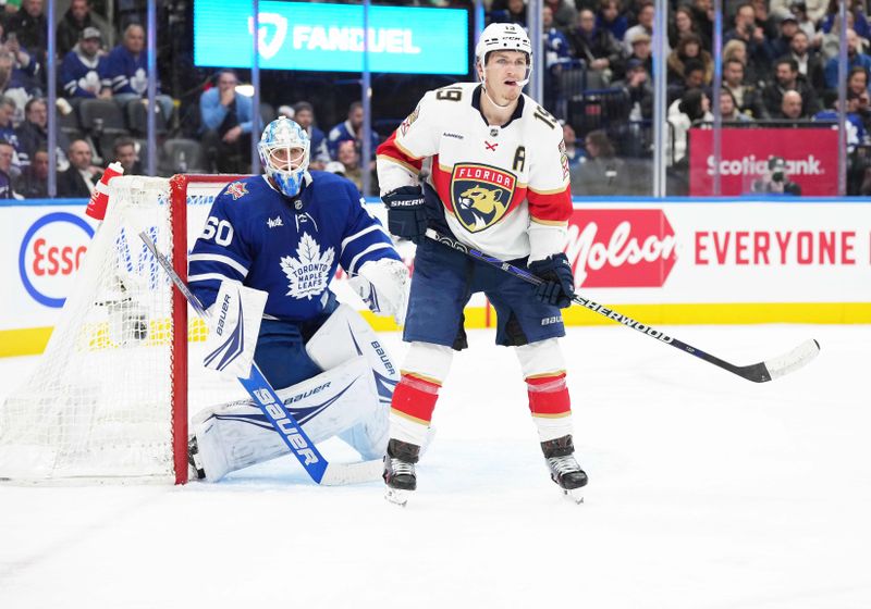 Nov 28, 2023; Toronto, Ontario, CAN; Florida Panthers left wing Matthew Tkachuk (19) stands in front of Toronto Maple Leafs goaltender Joseph Woll (60) during the second period at Scotiabank Arena. Mandatory Credit: Nick Turchiaro-USA TODAY Sports