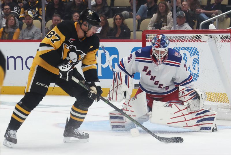 Oct 11, 2025; Pittsburgh, Pennsylvania, USA;  New York Rangers goaltender Igor Shesterkin (31) defends Pittsburgh Penguins center Sidney Crosby (87) during the third period at PPG Paints Arena. Mandatory Credit: Charles LeClaire-Imagn Images