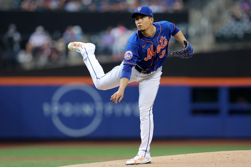 Jun 28, 2023; New York City, New York, USA; New York Mets starting pitcher Kodai Senga (34) follows through on a pitch against the Milwaukee Brewers during the first inning at Citi Field. Mandatory Credit: Brad Penner-USA TODAY Sports