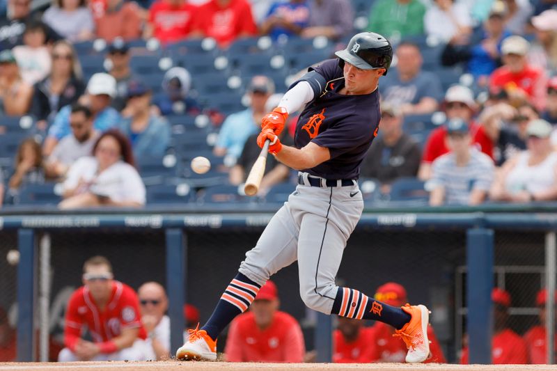 Mar 19, 2023; West Palm Beach, Florida, USA; Detroit Tigers right fielder Kerry Carpenter (30) hits a double during the first inning against the Washington Nationals at The Ballpark of the Palm Beaches. Mandatory Credit: Sam Navarro-USA TODAY Sports