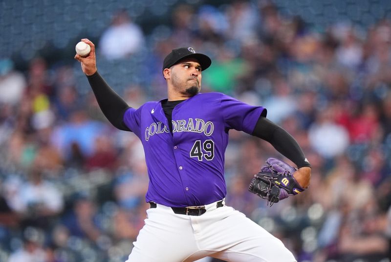 Sep 16, 2024; Denver, Colorado, USA; Colorado Rockies pitcher Antonio Senzatela (49) delivers a pitch in the first inning against the Arizona Diamondbacks at Coors Field. Mandatory Credit: Ron Chenoy-Imagn Images