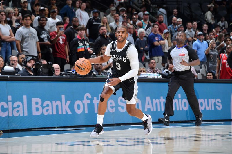 SAN ANTONIO, TX - OCTOBER 28:  Chris Paul #3 of the San Antonio Spurs dribbles the ball during the game against the Houston Rockets during a regular season game on October 28, 2024 at the Frost Bank Center in San Antonio, Texas. NOTE TO USER: User expressly acknowledges and agrees that, by downloading and or using this photograph, user is consenting to the terms and conditions of the Getty Images License Agreement. Mandatory Copyright Notice: Copyright 2024 NBAE (Photos by Michael Gonzales/NBAE via Getty Images)