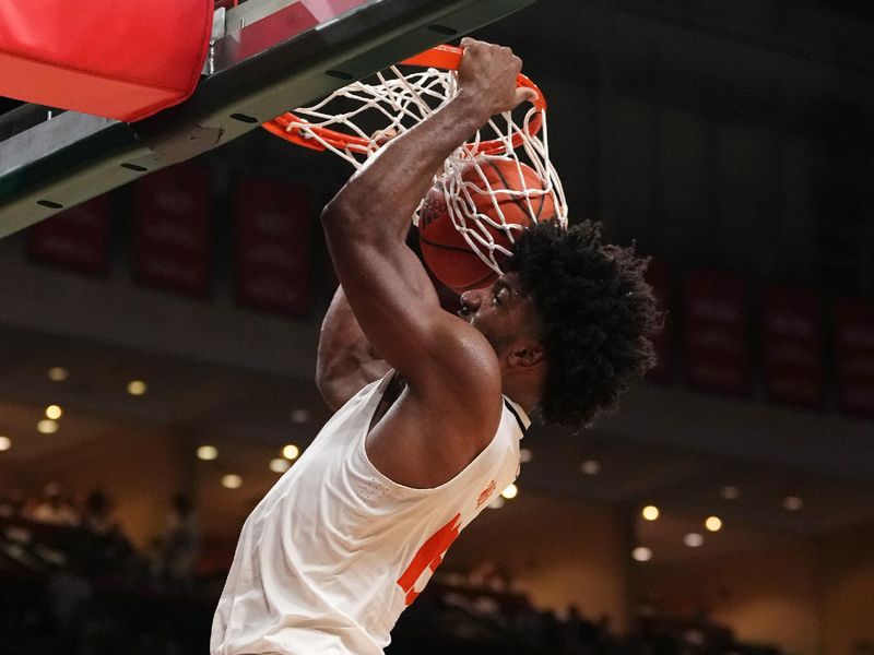 Feb 6, 2023; Coral Gables, Florida, USA; Miami Hurricanes forward Norchad Omier (15) dunks the ball against the Duke Blue Devils during the second half at Watsco Center. Mandatory Credit: Jasen Vinlove-USA TODAY Sports