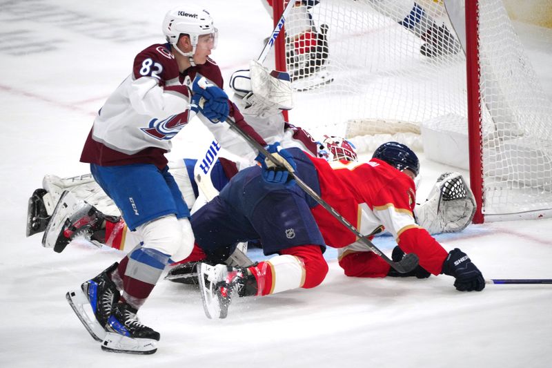 Nov 23, 2024; Sunrise, Florida, USA;  Colorado Avalanche center Ivan Ivan (82) gets called for hooking in the second period against the Florida Panthers at Amerant Bank Arena. Mandatory Credit: Jim Rassol-Imagn Images