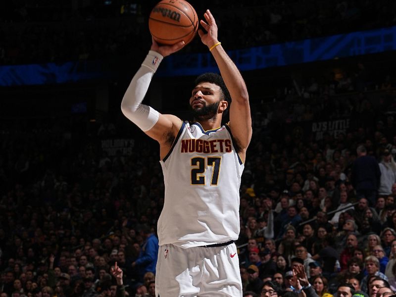 DENVER, CO - FEBRUARY 28: Jamal Murray #27 of the Denver Nuggets three point basket during the game against the Sacramento Kings on February 28, 2024 at the Ball Arena in Denver, Colorado. NOTE TO USER: User expressly acknowledges and agrees that, by downloading and/or using this Photograph, user is consenting to the terms and conditions of the Getty Images License Agreement. Mandatory Copyright Notice: Copyright 2024 NBAE (Photo by Garrett Ellwood/NBAE via Getty Images)