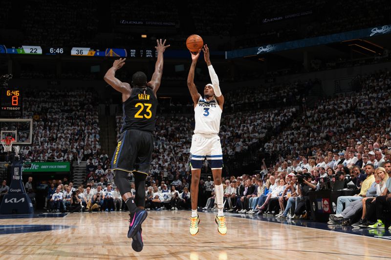MINNEAPOLIS, MN -  MAY 6: Jaden McDaniels #3 of the Minnesota Timberwolves shoots a three point basket during the game against the Golden State Warriors during Round 2 Game 1 of the 2025 NBA Playoffs on May 6, 2025 at Target Center in Minneapolis, Minnesota. NOTE TO USER: User expressly acknowledges and agrees that, by downloading and or using this Photograph, user is consenting to the terms and conditions of the Getty Images License Agreement. Mandatory Copyright Notice: Copyright 2025 NBAE (Photo by Jesse D. Garrabrant/NBAE via Getty Images)