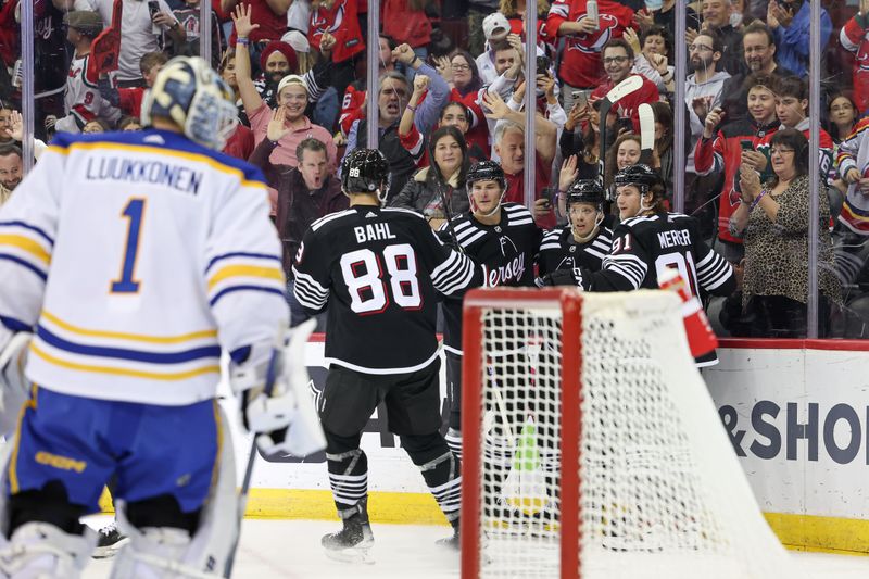 Oct 27, 2023; Newark, New Jersey, USA; New Jersey Devils left wing Erik Haula (56) celebrates his goal with teammates during the third period against Buffalo Sabres goaltender Ukko-Pekka Luukkonen (1) at Prudential Center. Mandatory Credit: Vincent Carchietta-USA TODAY Sports