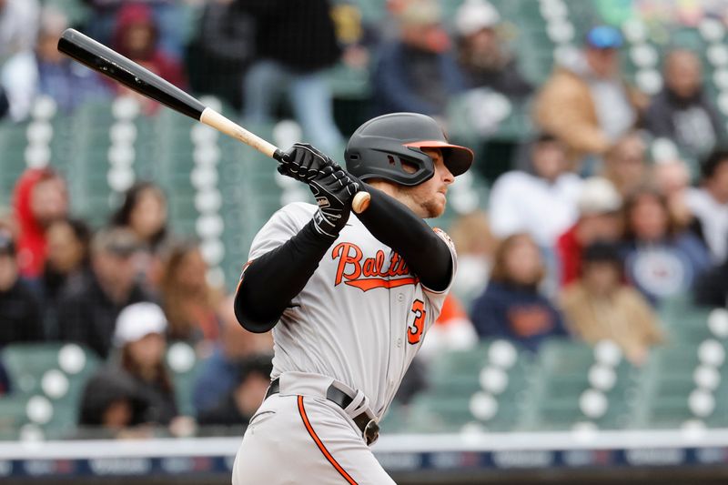 Apr 30, 2023; Detroit, Michigan, USA; Baltimore Orioles first baseman Ryan O Hearn (32) hits an RBI single in the second inning against the Detroit Tigers at Comerica Park. Mandatory Credit: Rick Osentoski-USA TODAY Sports