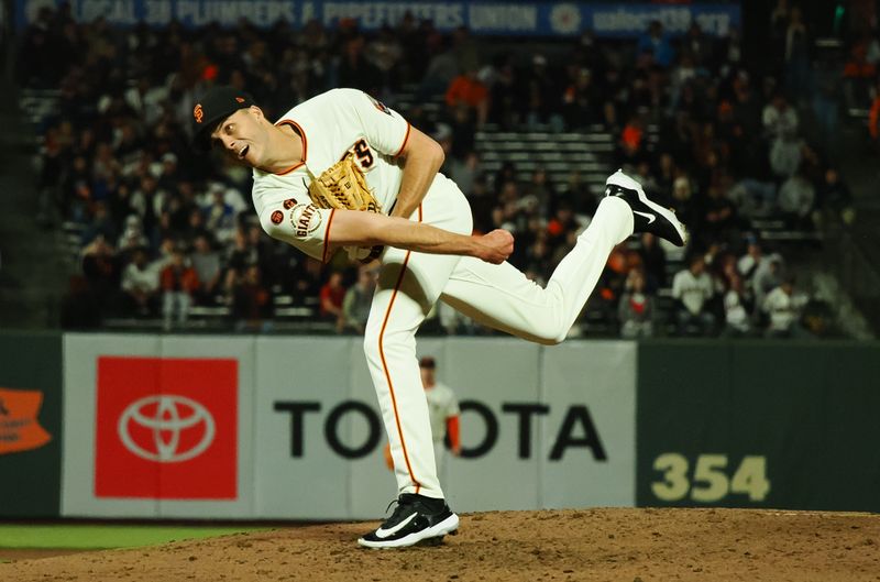 Aug 28, 2023; San Francisco, California, USA; San Francisco Giants relief pitcher Tyler Rogers (71) pitches the ball against the Cincinnati Reds during the eighth inning at Oracle Park. Mandatory Credit: Kelley L Cox-USA TODAY Sports